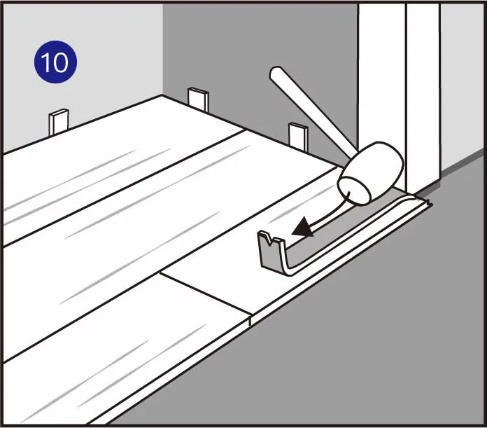 用橡胶锤和拉杆将最后一块地板锁成一排。在排的未尾插入垫片。直至安装至最后一排。